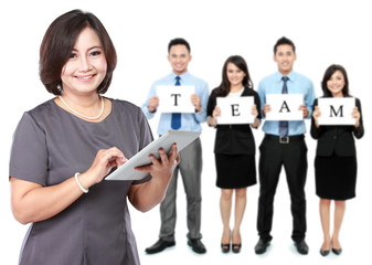 happy mature business women with her staff, teamwork concept