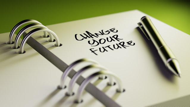 Closeup of a personal agenda setting an important date writing w