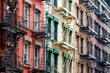 Fotobehang Colored Apartment Buildings in New York City © deberarr