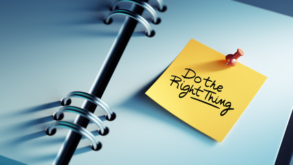 Closeup Yellow Sticky Note paste it in a notebook setting an app