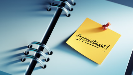 Closeup Yellow Sticky Note paste it in a notebook setting an app