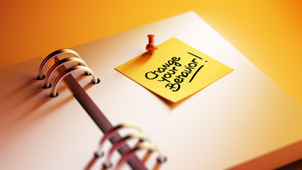 Closeup Yellow Sticky Note paste it in a notebook setting an app