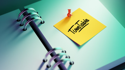 Closeup Yellow Sticky Note paste it in a notebook setting an app