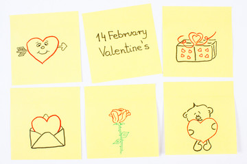 Symbols of Valentines Day drawn on paper, symbol of love