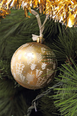 Golden ball on the Christmas tree
