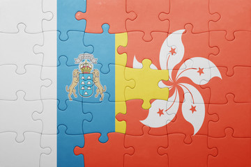 puzzle with the national flag of canary islands and hong kong