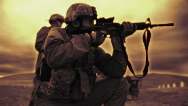 High contrast shot of kneeling soldier at target range