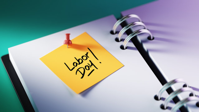 Closeup Yellow Sticky Note paste it in a notebook setting an app