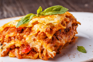 Traditional lasagna made with minced beef bolognese sauce