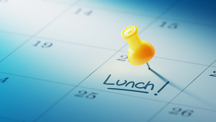 Concept image of a Calendar with a yellow push pin. Closeup shot