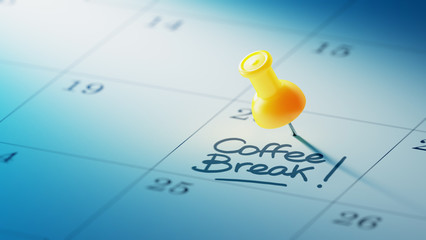 Concept image of a Calendar with a yellow push pin. Closeup shot