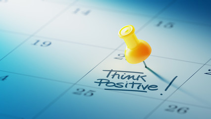Concept image of a Calendar with a yellow push pin. Closeup shot