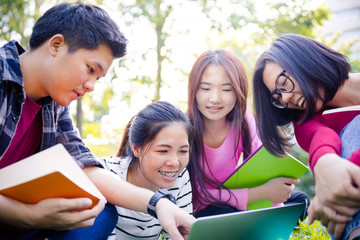 Group of university students having fun outdoors