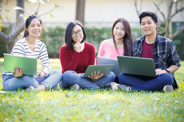 Group of university students having fun outdoors