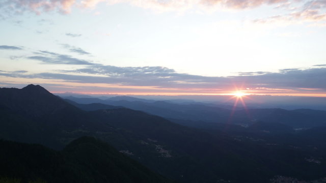 Sunrise on Alps mountain top in nord italy  time lapse  