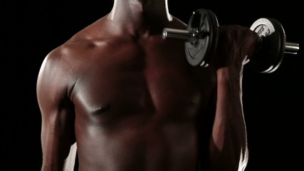 Man train with tools isolated on black