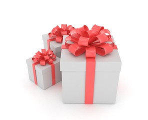 three gift boxes with bows isolated on white