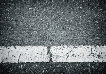 White line on the road texture background