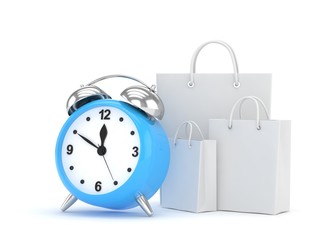 alarm clock and shopping bag (time to buy concept)