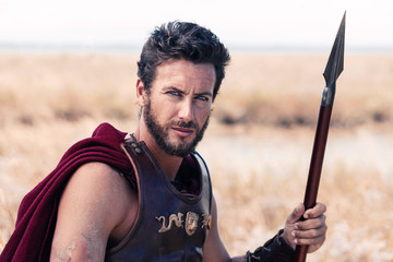 Handsome ancient warrior in armor