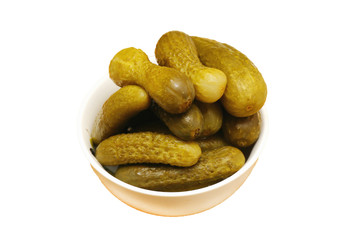 Pickles (gherkins) in small white bowl