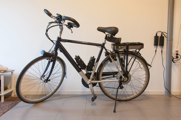 Fototapeta na wymiar Electric bicycle in a garage