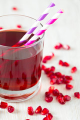 pomegranate juice on table