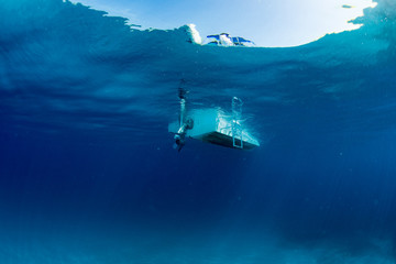boat ship from underwater blue ocean