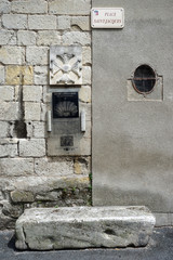Signs on the wall of Saint Jaques church