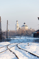 Fototapeta premium ..Snow-covered railway station, old wagons, in the Russian provi
