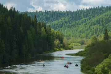 Mountains river and rafts
