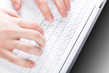Obraz na płótnie Canvas Typing on computer keyboard
