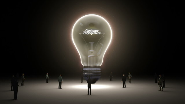 Typo 'Customer Engagement' in light bulb and surrounded businessmen, engineers, idea concept version (included alpha)