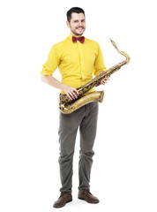 Naklejka premium man saxophonist playing saxophone player in studio isolated on w