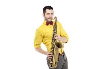 Fototapeta na wymiar man saxophonist playing saxophone player in studio isolated on w