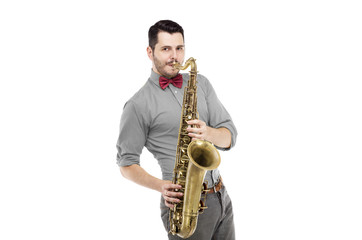 Fototapeta na wymiar saxophone player in bright blue shirt with bowtie, isolated on white background. stylish man musician look into camera. musical teacher