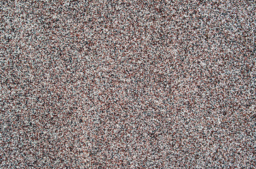 Background of small black, red and white stones
