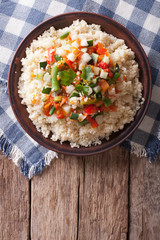Asian Couscous with vegetables. vertical top view
