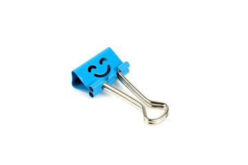 Blue happy face paperclip on white background. 