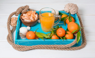 Tropical still life with tangerines