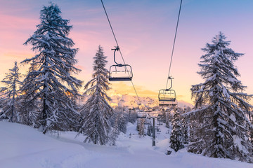 Winter mountains panorama with ski slopes and ski lifts - obrazy, fototapety, plakaty