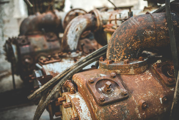 abandoned mine - rusty external pumps equipment