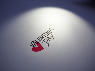 Valentine text on white paper
