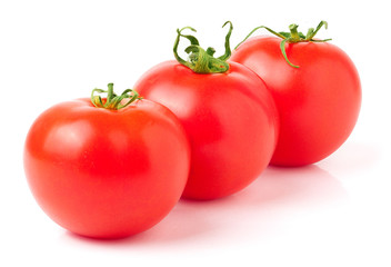 Three red tomatoes isolated on white background