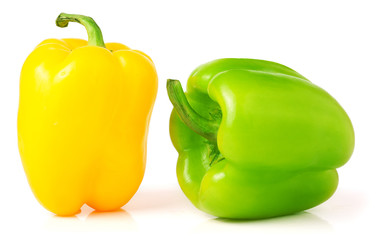 Yellow and green bell peppers isolated on white background