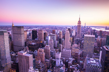 Colorful New York City skyline at sunset