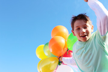 boy with colorfull balloons