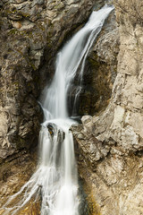 Obraz na płótnie Canvas scenic waterfalls in rocky landscape