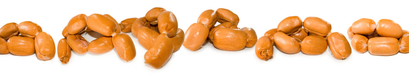 many sausage closeup on a white background