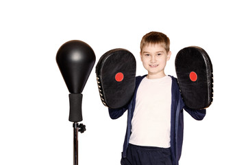 little boy in boxing gloves on a white background